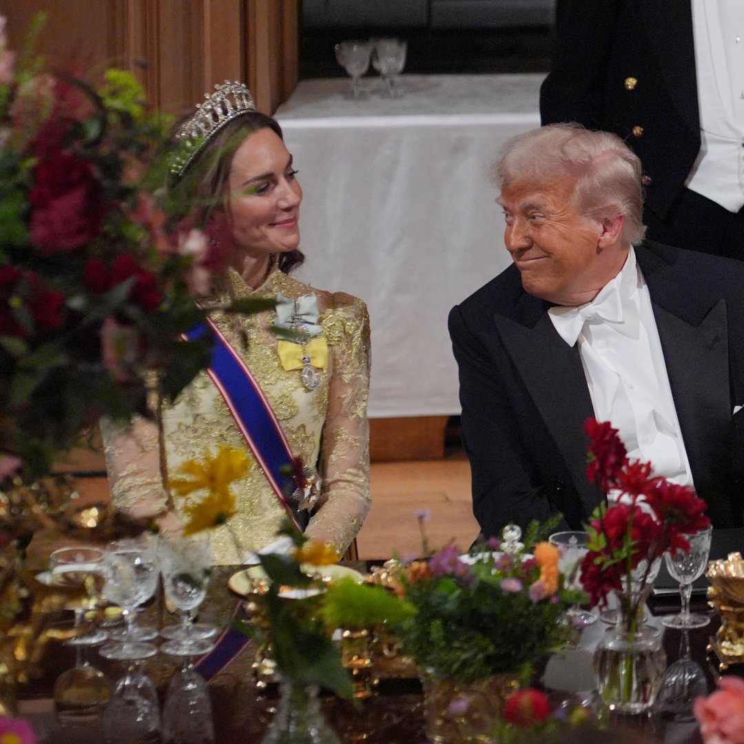Kate Middleton wearing a gold dress sitting next to Donald Trump at a banquet
