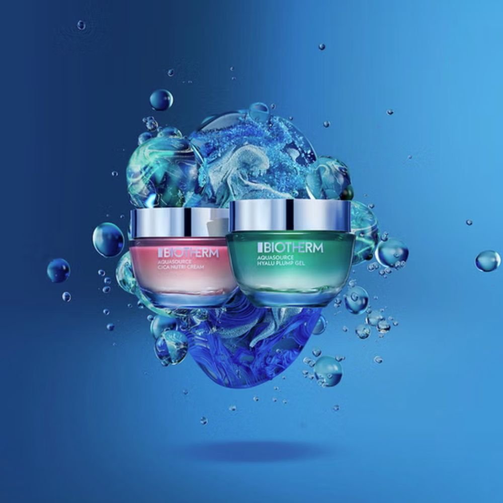 Blue background with two Biotherm AquaSource products, and water splash effect